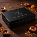 Black gift box with leatherette lid engraved with a logo and Wishing you a bright Diwali